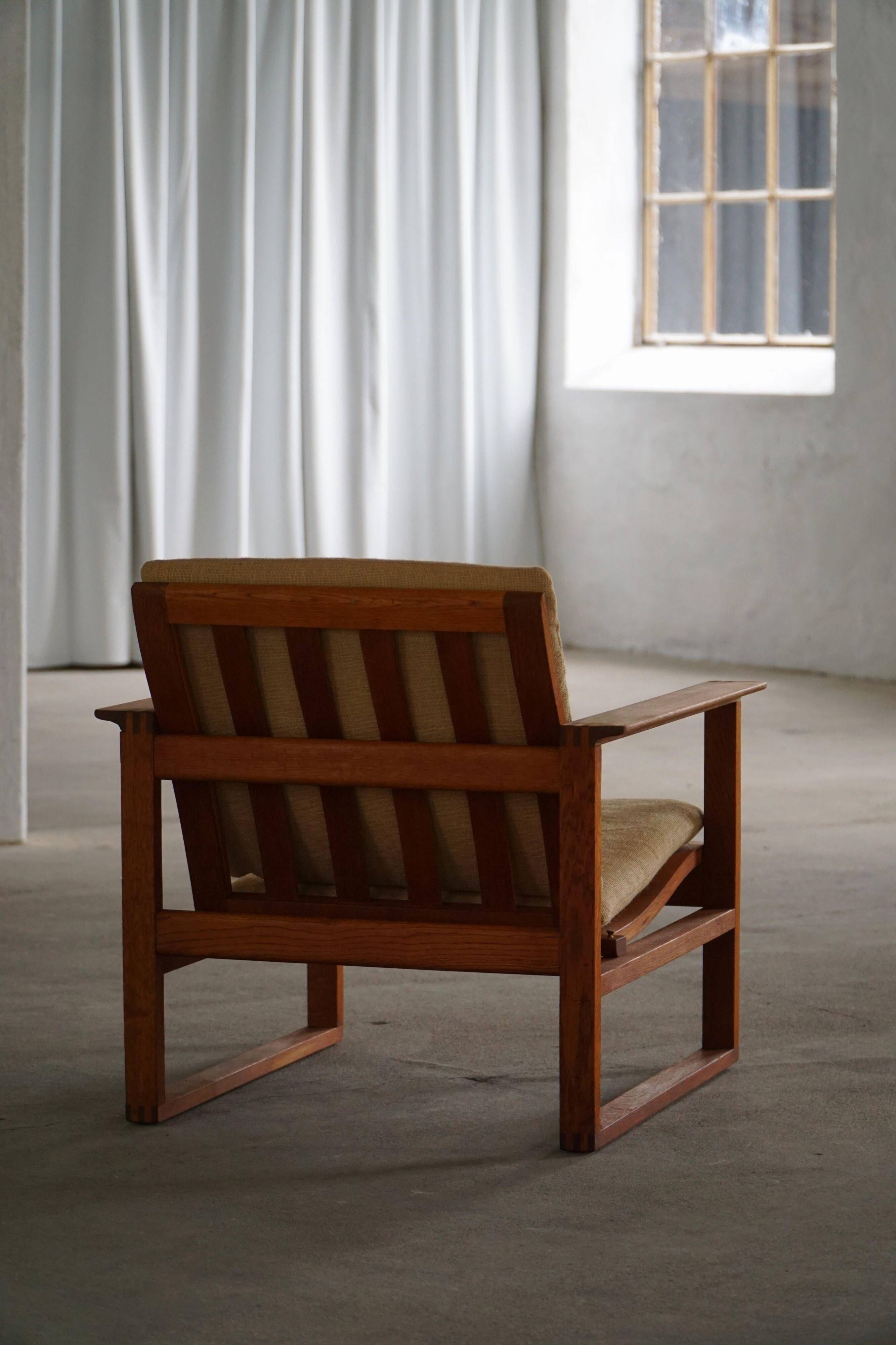 Børge Mogensen, a pair of BM2256 lounge chairs in oak and jute, Denmark, 1960s.