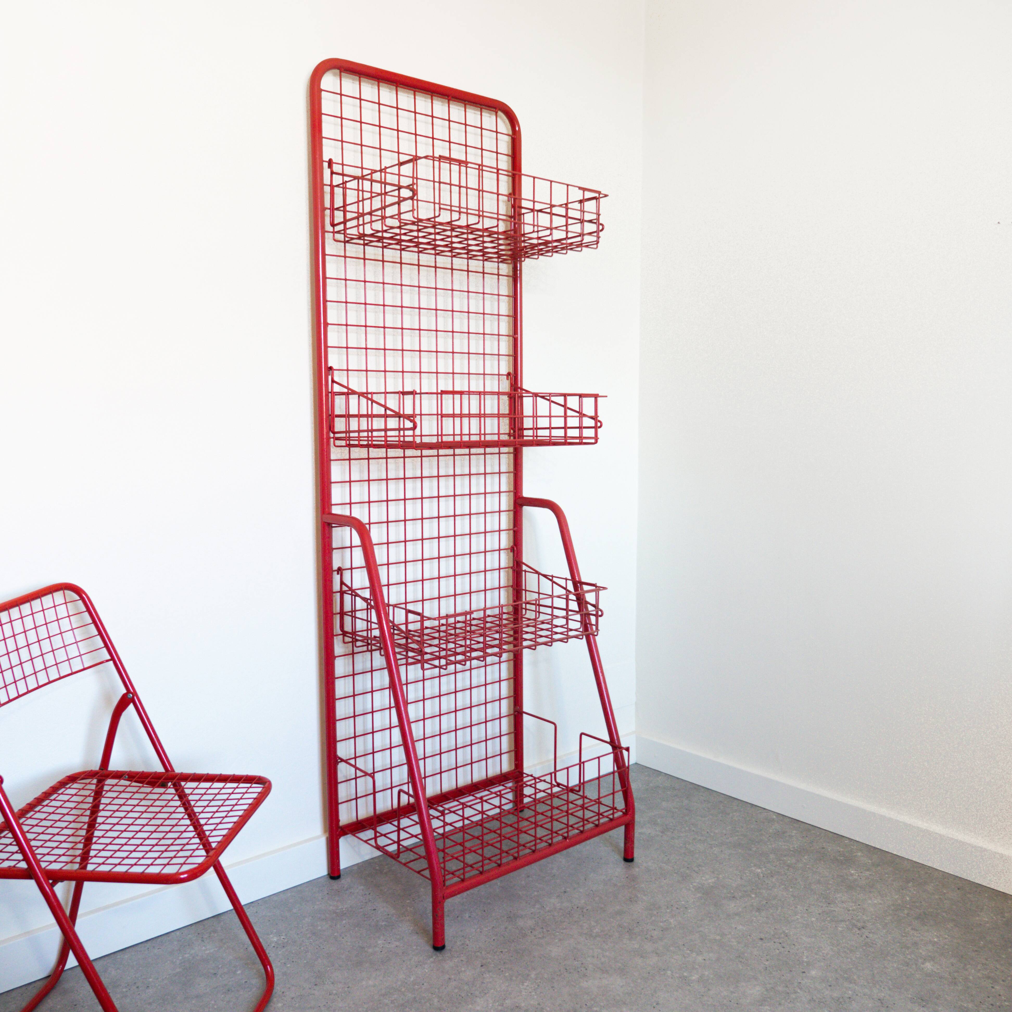 Red mesh metal grocery shelf