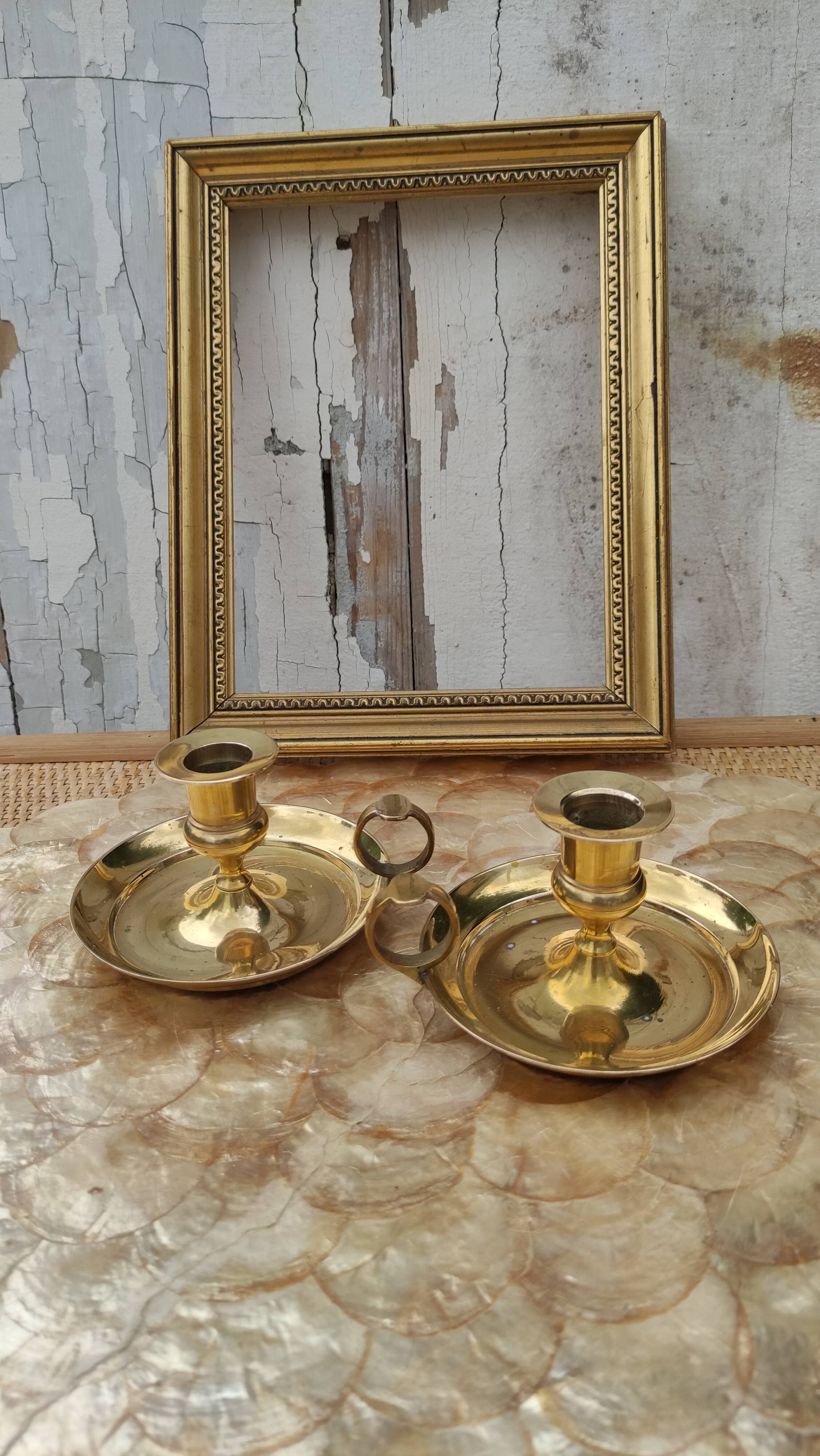 Pair of antique solid brass candle holders