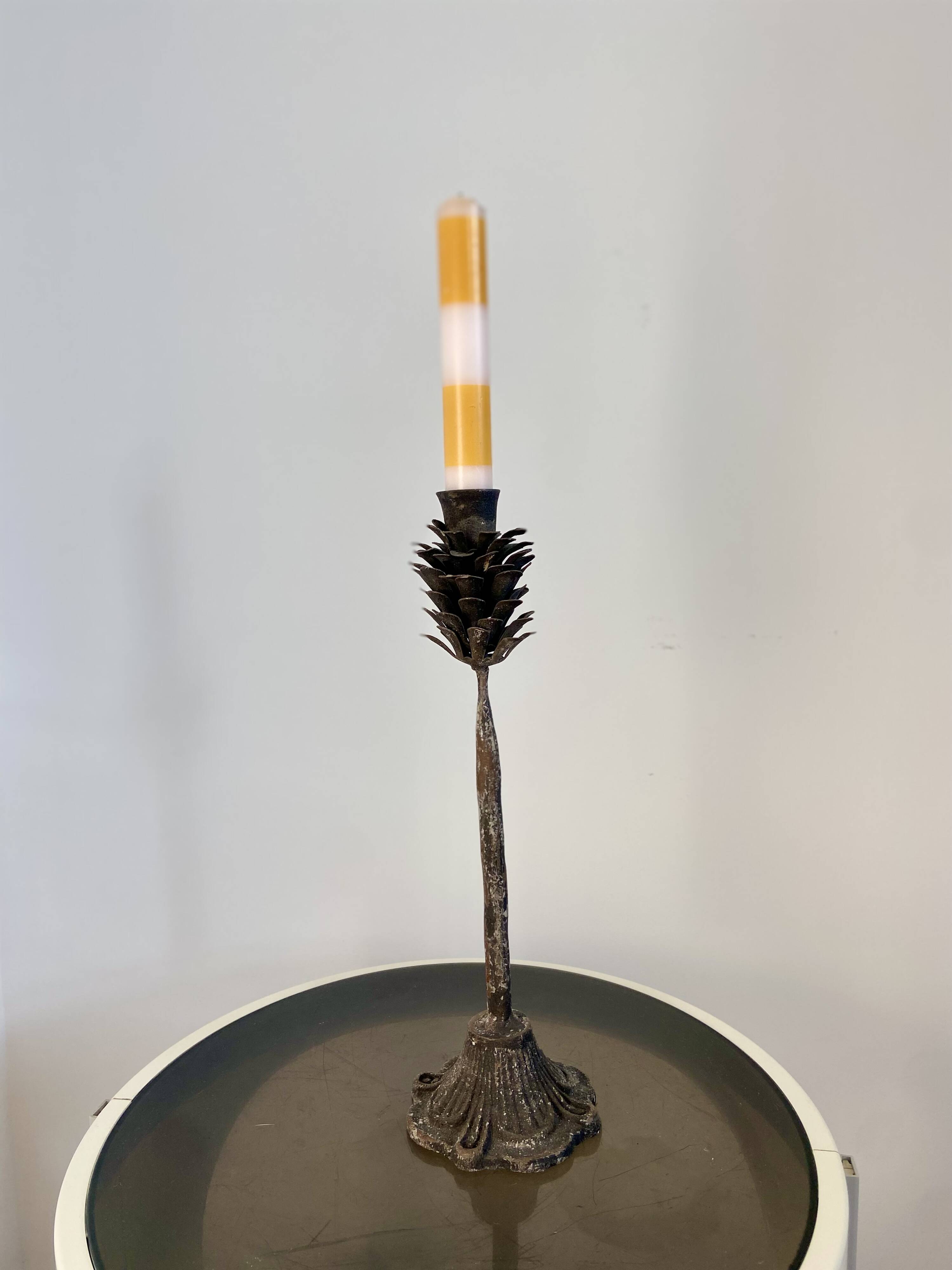 Metal pine cone candle holder