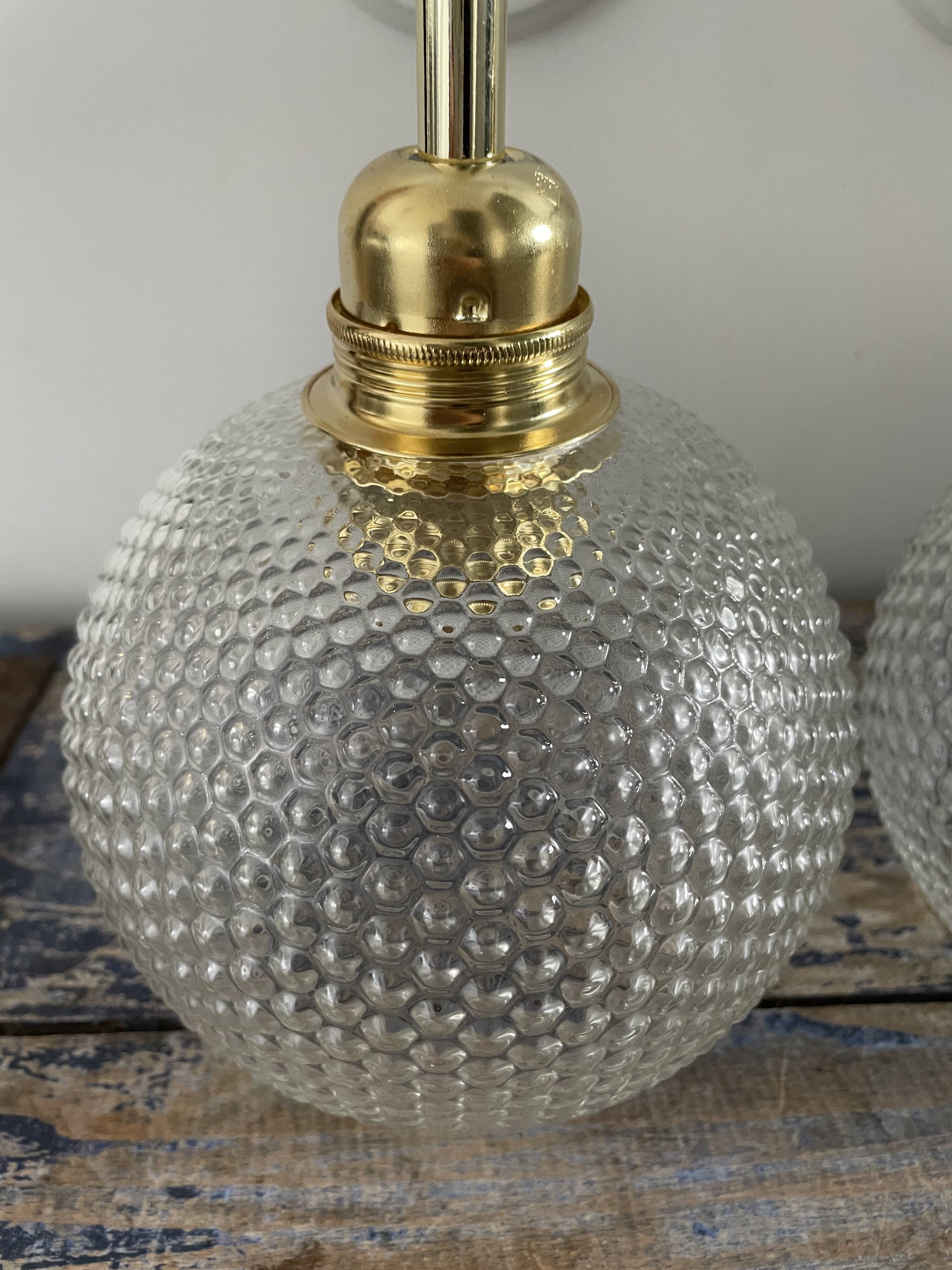 Pair of wall sconces glass globes