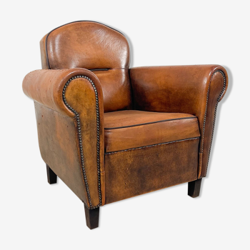 Vintage hand colored sheep leather armchair