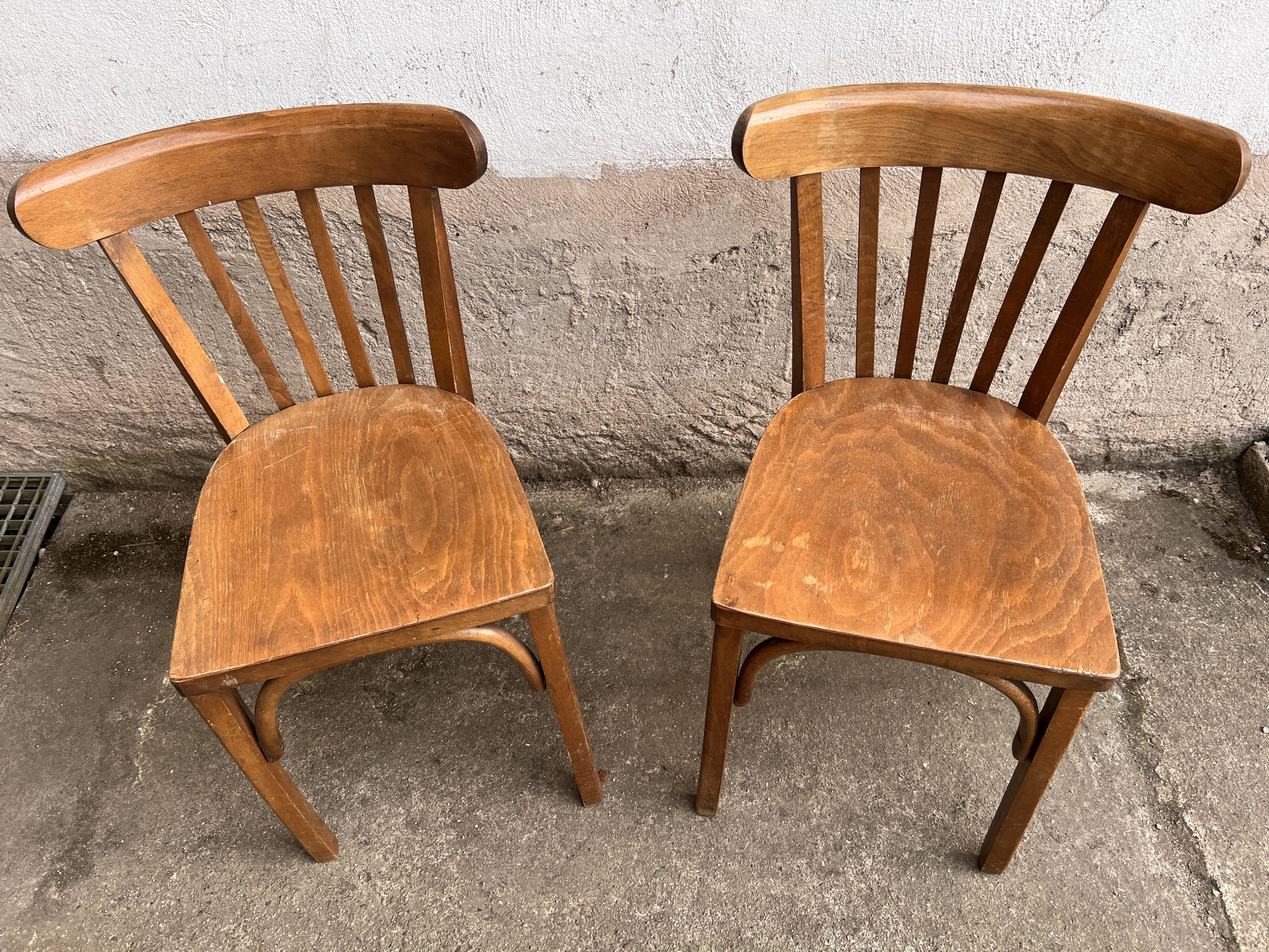 Pair of vintage wooden bistro chairs