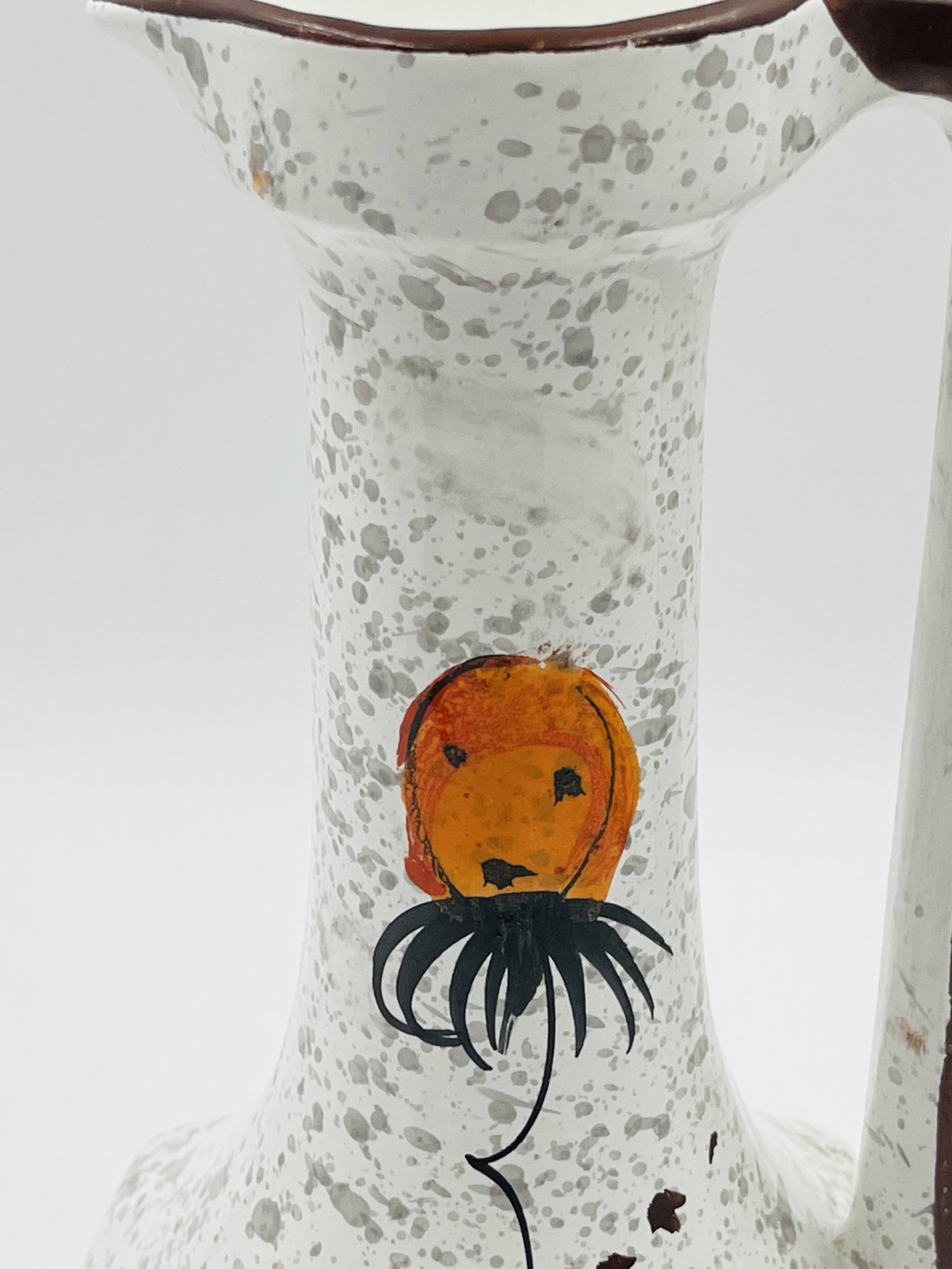 Vintage Italian vase in the shape of a carafe with floral decoration from the 1970s.