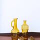 Set of two vintage amber glass carafes attributed to Lubiana.