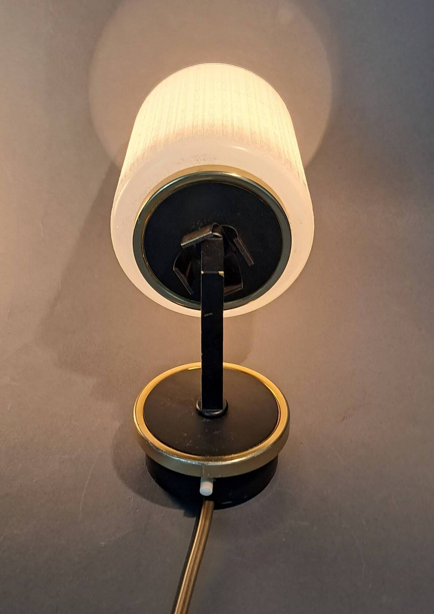 Pair of wall lights in gilded brass, black metal and opaline, 1960