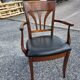 Mid-20th century solid cherry wood office chair.