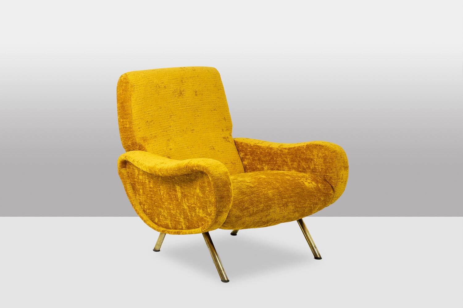 Marco Zanuso for Artflex. Yellow and gilded brass armchairs. 1950s.