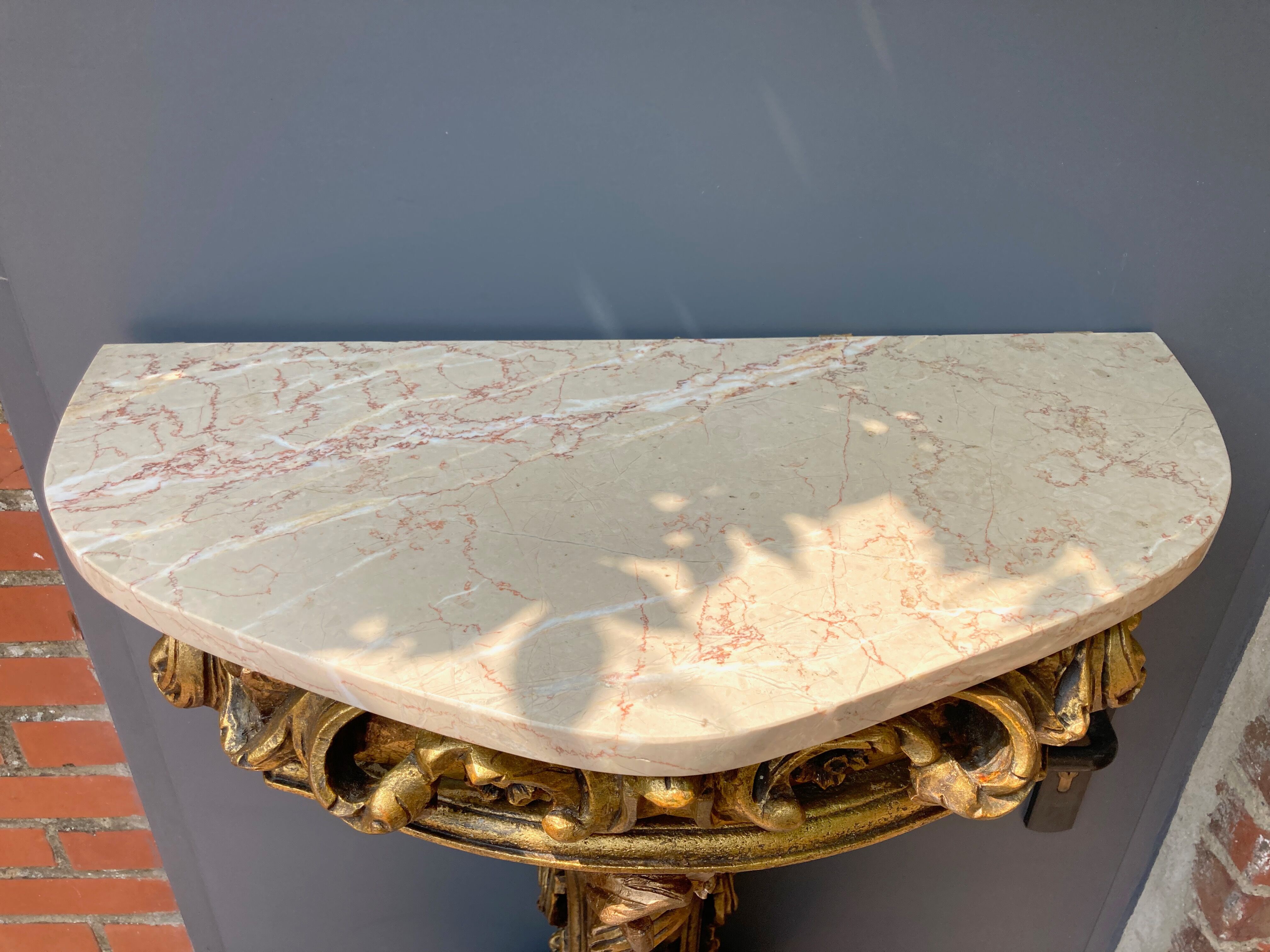 Carved wooden and marble console