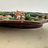 Plat en barbotine décor de coquillages et de lézard Palissy