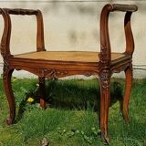 Former seat, wood and caning.