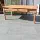 Solid wood coffee table with drawer and original key.