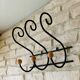 Coat rack/wrought iron hat holder