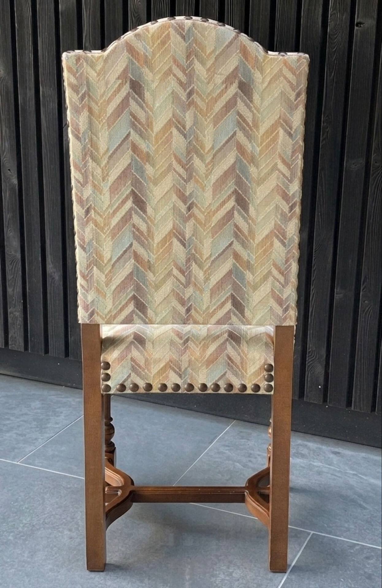 Restored and reupholstered antique chair with character