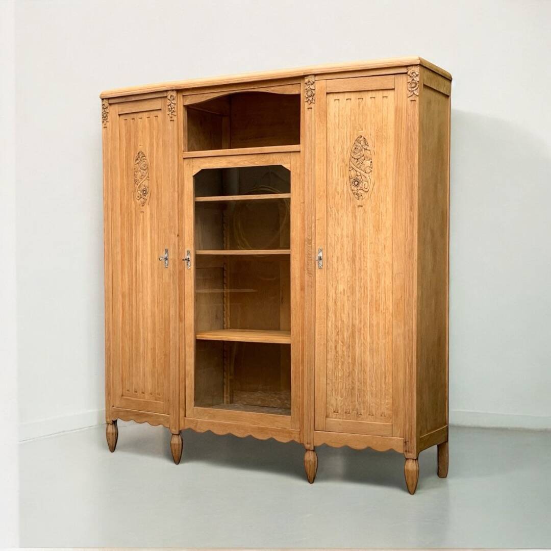 Parisian Art Deco asymmetrical glass cabinet in raw oak, 1930