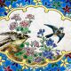 Assiette Longwy début XXe  – Émaux cloisonnés à décor d’oiseaux et fleurs