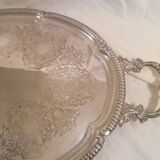 Very large quadripod oval serving tray in rococco style/silver metal
