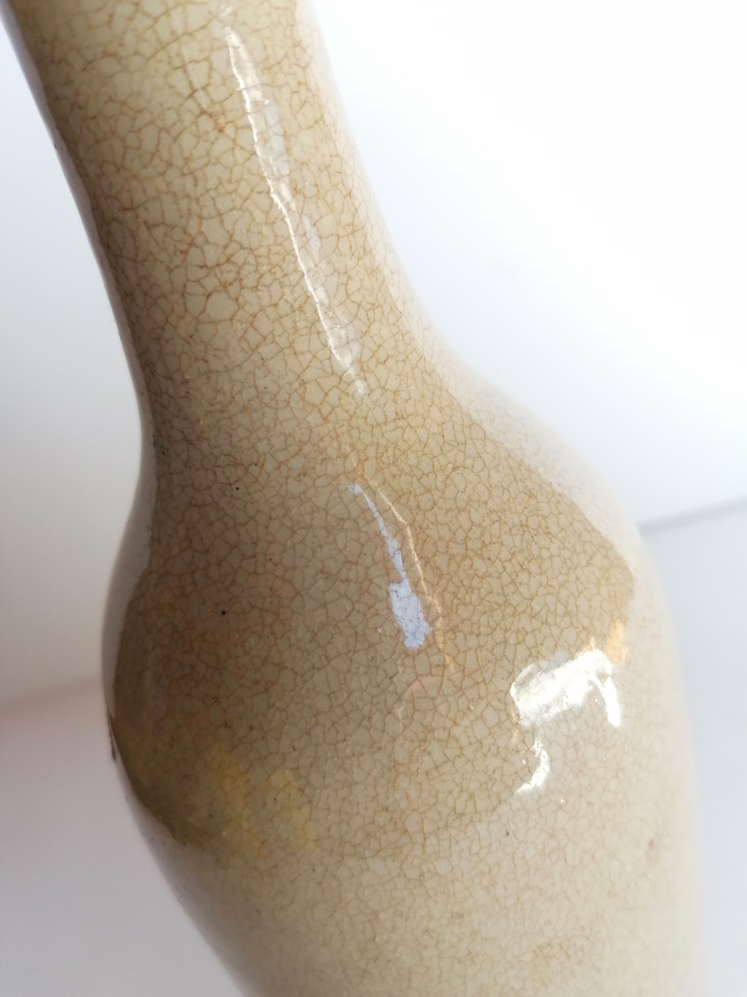 Cracked enamelled sandstone bottle