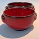 Red ceramic pieces by Gérard Hoffman (1917/1965).