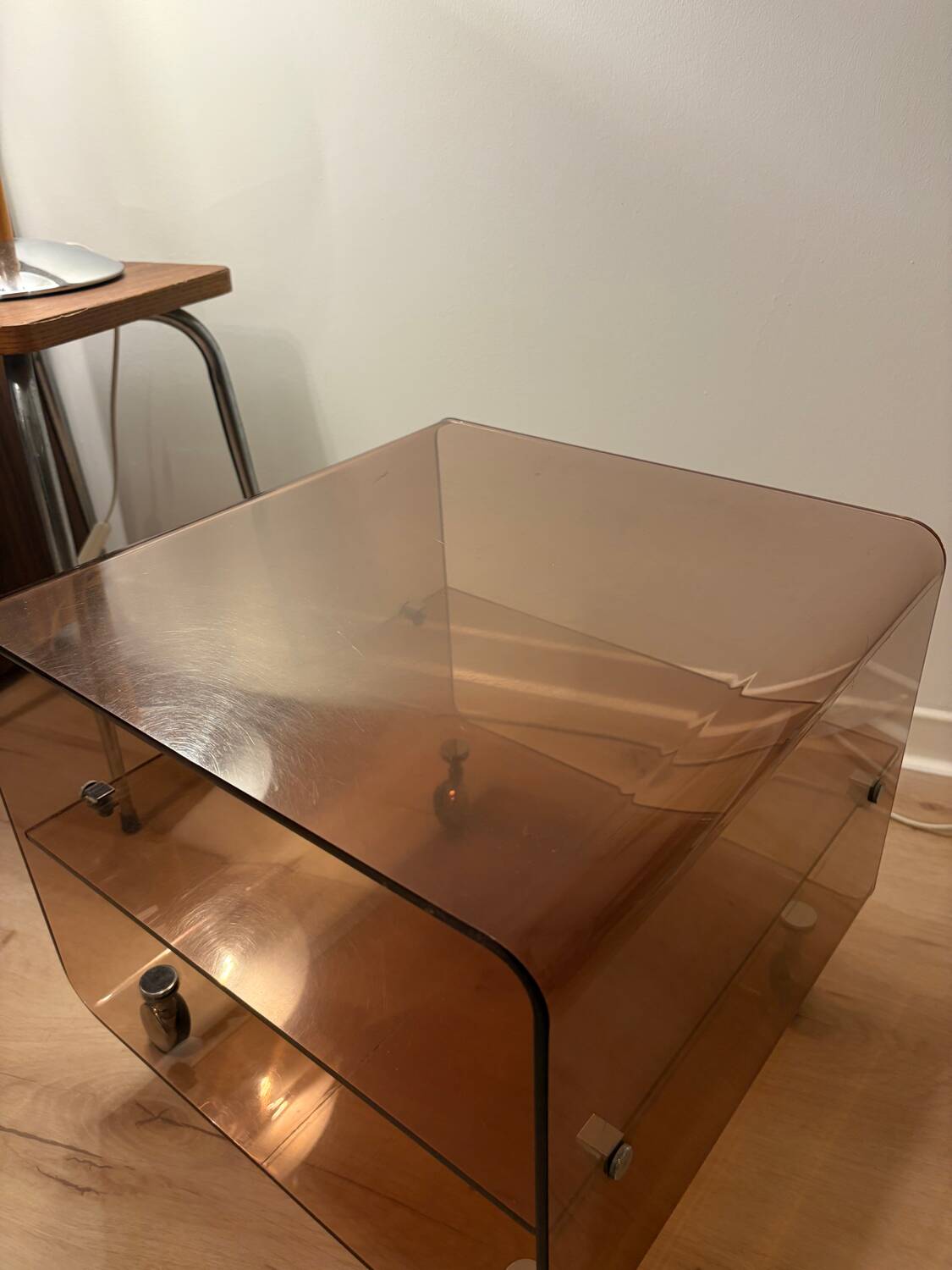 Smoked plexiglass side table/occasional table by designer Michel Dumas.