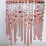 Pink glass wall lamp with garland of pearls