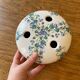 Ceramic flower pique