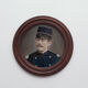 Portrait man in frame round wood