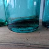 3 old green bottles