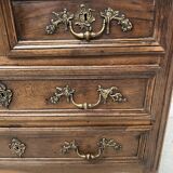 Louis XIV style chest of drawers in solid oak, 18th century