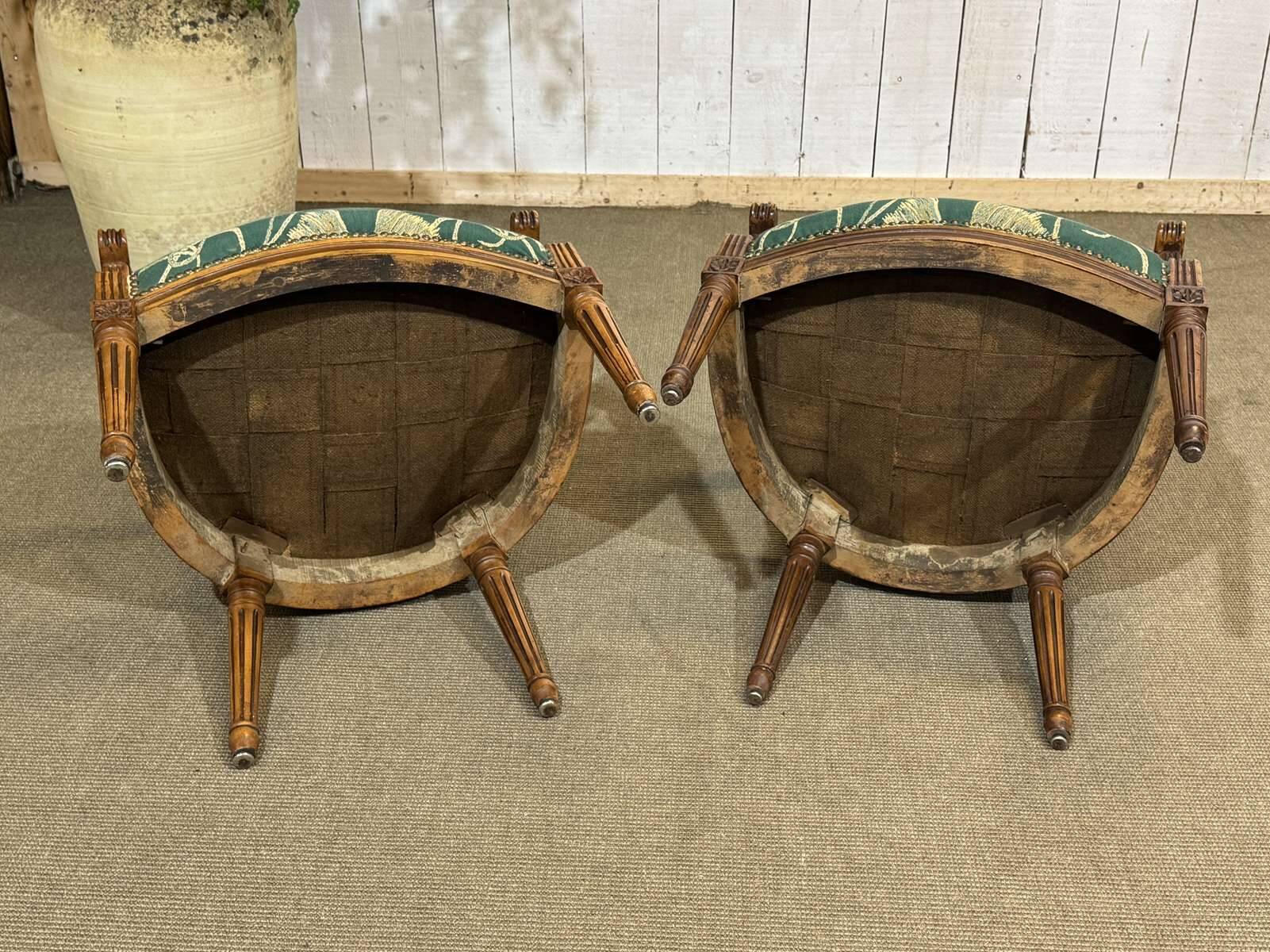 Pair of Louis XVI style armchairs in beech from the 19th century.