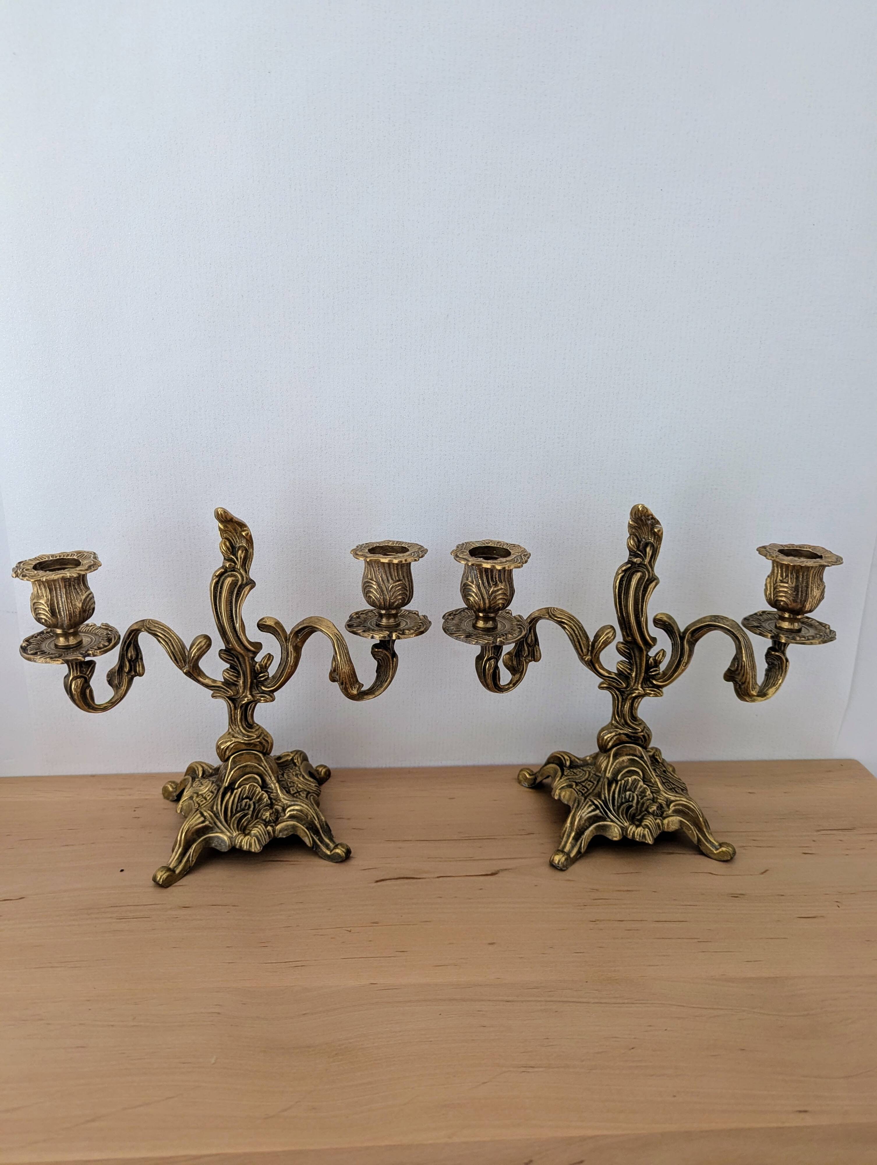 Pair of antique bronze candlesticks in the Louis XV rococo style