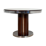 Round dining table with 1970s Italian design extension