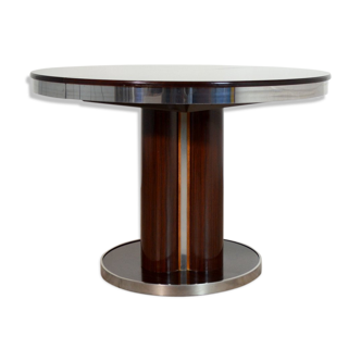 Round dining table with 1970s Italian design extension