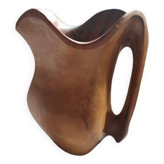 Olive wood pitcher.