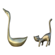 Cat and brass swan
