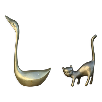Cat and brass swan