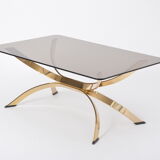 Gold Colored Mid-Century Modern coffee table with smoked Glass top