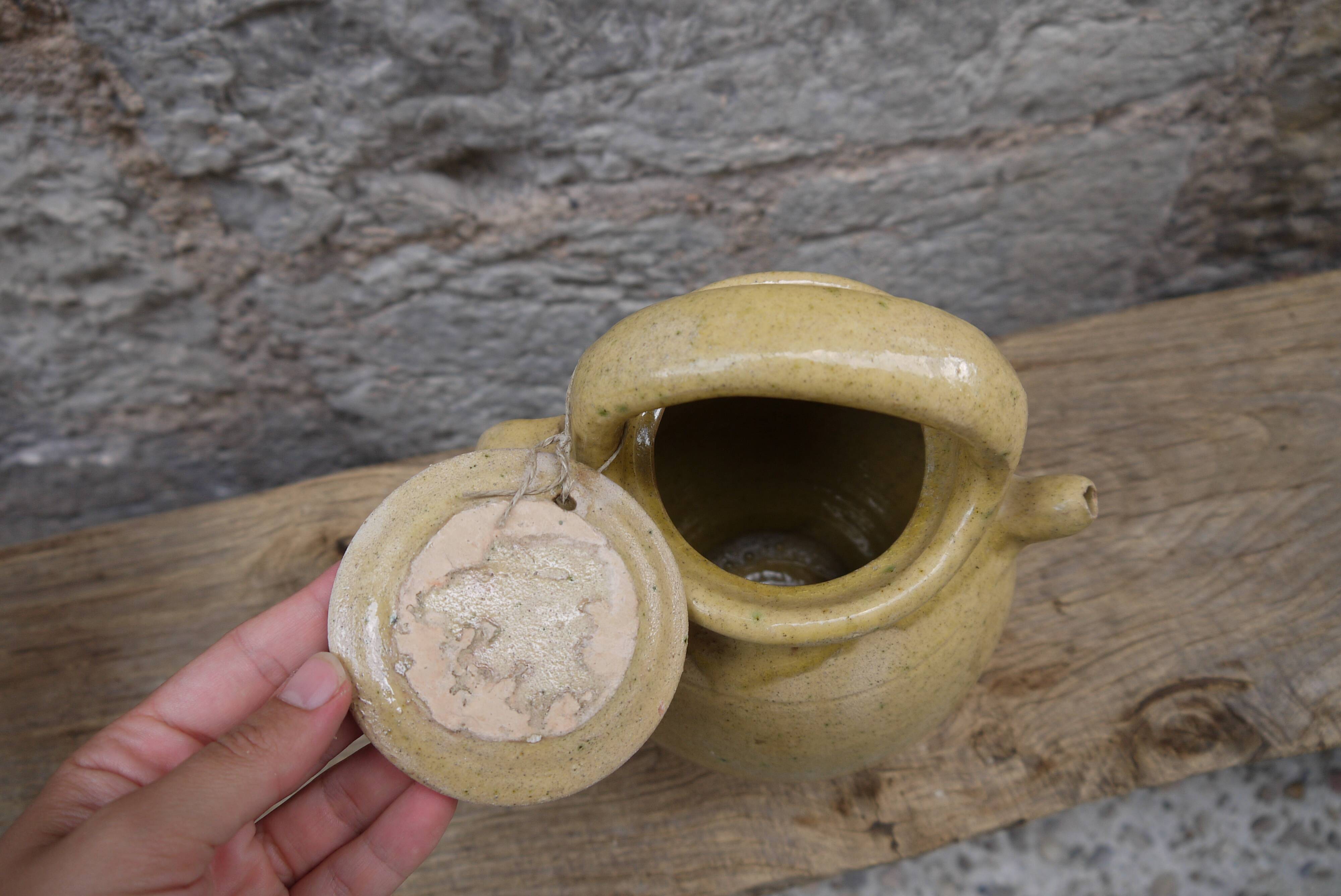 Terracotta jug gargoyle