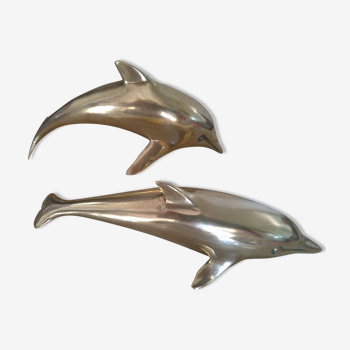 Brass dolphins