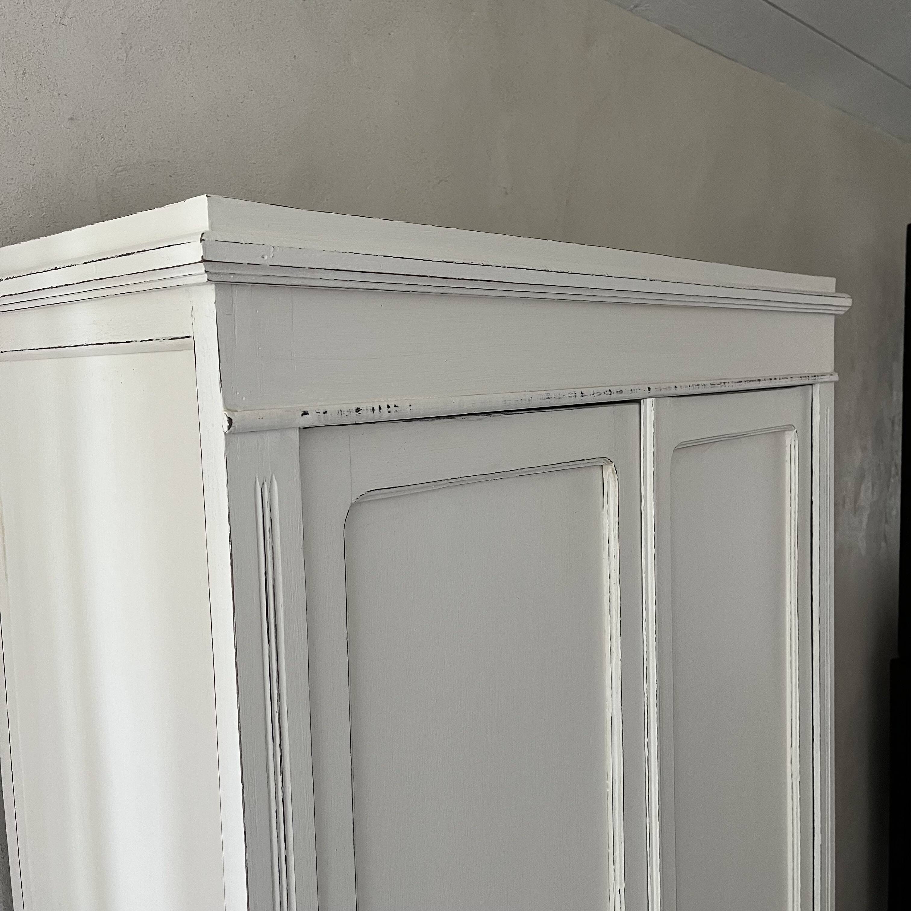 White patinated wardrobe