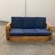 Sofa rectangulaire en rotin à six brins exclusif pour trois places, d'après Paul Frankl, années 50.