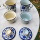 Paire de tasse à thé, couvercle et infuseur