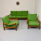 Living room sofa and Scandinavian design armchairs from the 1960s in green boucle.