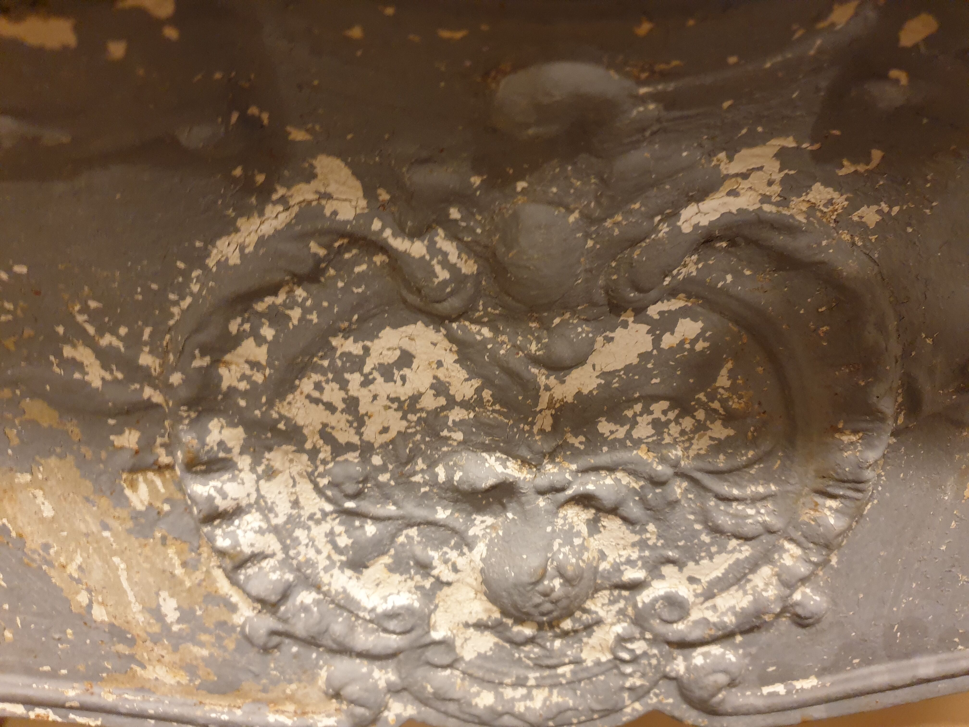 Cast iron chimney coat