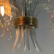 Asymmetrical Venetian chandelier in colourless and gold Murano glass, circa 1980.