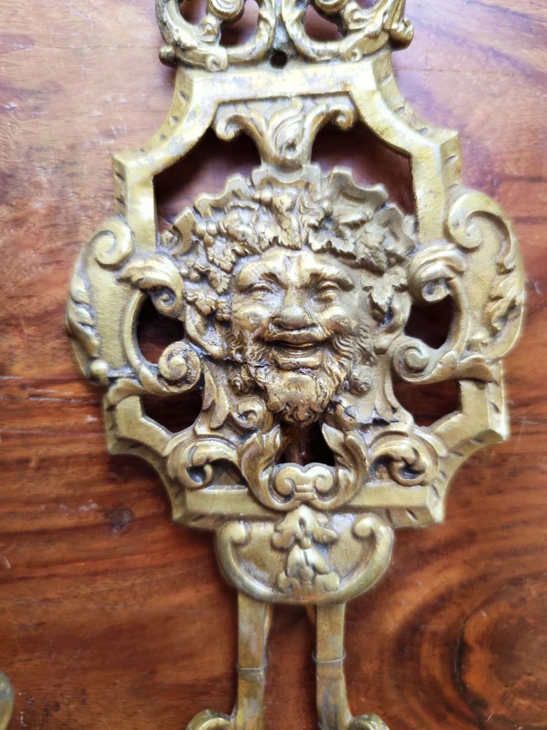 Pair of gilded bronze sconces decorated with Louis XIV style mascarons