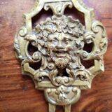 Pair of gilded bronze sconces decorated with Louis XIV style mascarons