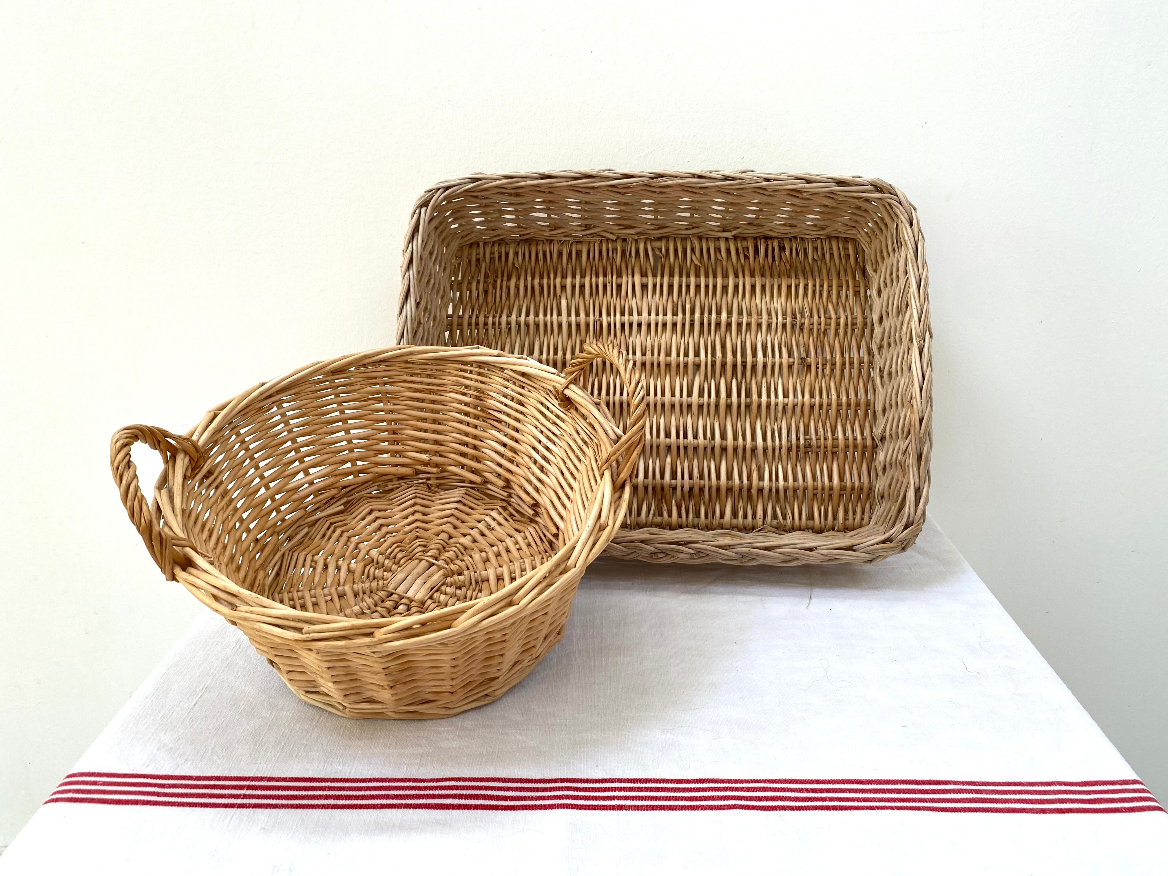 Duo of baskets in braided rattan