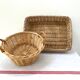 Duo of baskets in braided rattan