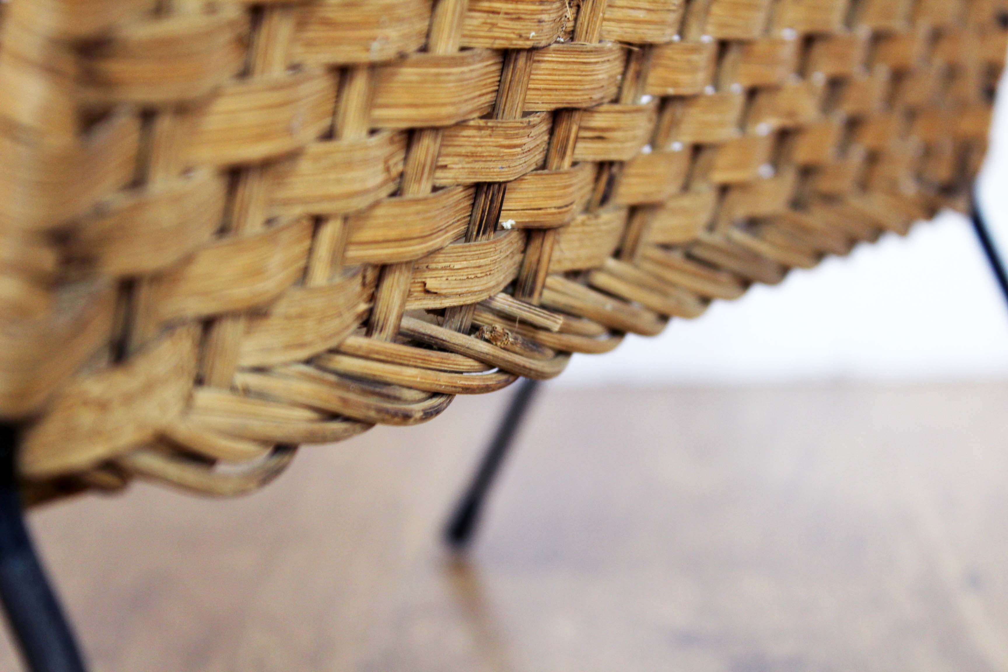 Vintage wicker magazine rack